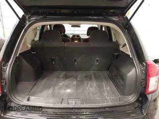 2014 Jeep Compass Sport with VIN 1C4NJCBA3ED777881, listed as a IAAI auction lot 41845518 with 113,566 mi miles. Bid and sale history available at carsss.com. Image 18.