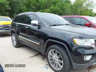 2013 Jeep Grand Cherokee Overland with VIN 1C4RJECT2DC588124, listed as a IAAI auction lot 42142573 with 204,309 mi miles and . Bid and sale history available at DreamBid. Image 13.