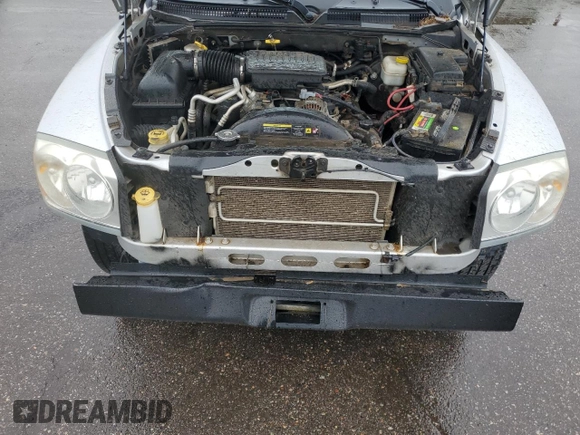 2005 Dodge Dakota SLT z VIN 1D7HW48N45S253901, wystawiony jako Copart lot #59167695 z przebiegiem 134 353 mil mil oraz Czysty tytuł • Clean title. Historia ofert i sprzedaży dostępna na DreamBid. Obrazek 11.