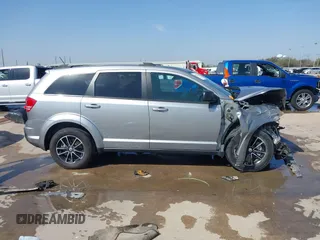 2017 Dodge Journey SE with VIN 3C4PDCABXHT662235, listed as a IAAI auction lot 41767844 with Not Provided miles and . Bid and sale history available at DreamBid. Image 13.