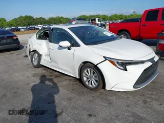 2024 Toyota Corolla Hybrid LE with VIN JTDBCMFE2RJ031865, listed as a IAAI auction lot 41602715 with 10,892 mi miles. Bid and sale history available at carsss.com. Image 1.