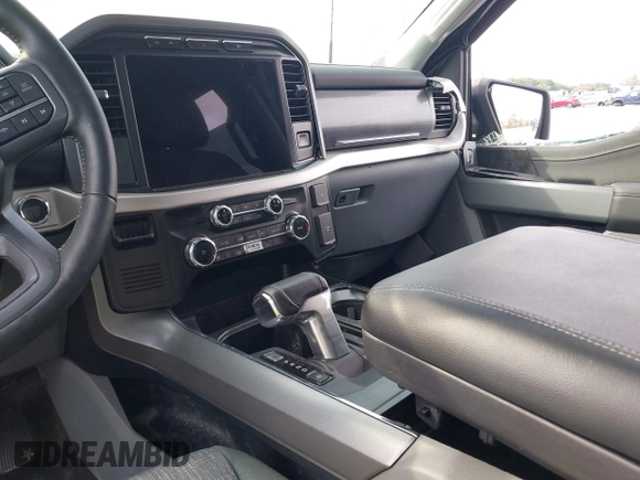 2023 Ford F-150 Lightning Pro z VIN 1FTVW1ELXPWG15885, wystawiony jako IAAI lot #41631871 z przebiegiem 88 151 mil mil oraz . Historia ofert i sprzedaży dostępna na DreamBid. Obrazek 17.