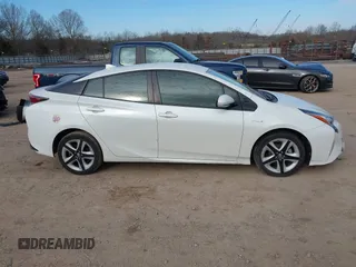 2016 Toyota Prius Four with VIN JTDKARFU3G3021048, listed as a IAAI auction lot 41633306 with 120,632 mi miles. Bid and sale history available at carsss.com. Image 13.