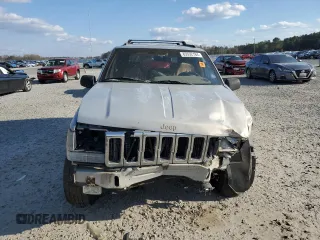 1998 Jeep Grand Cherokee with VIN 1J4GX48Y7WC216585, listed as a Copart auction lot 83532184 with 144,739 mi miles and Salvage title. Bid and sale history available at DreamBid. Image 5.