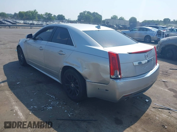 2012 Cadillac CTS with VIN 1G6DC5E51C0156873, listed as a IAAI auction lot 42587421 with 169,006 mi miles and . Bid and sale history available at DreamBid. Image 3.
