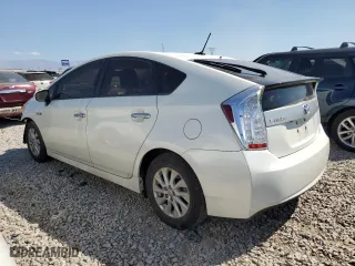 2012 Toyota Prius Plug-In with VIN JTDKN3DP9C3019460, listed as a Copart auction lot 71377474 with 100,689 mi miles and Salvage Title. Bid and sale history available at carsss.com. Image 2.
