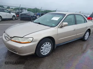 2002 Honda Accord LX z VIN JHMCG56402C025464, wystawiony jako IAAI lot #42458693 z przebiegiem 257 711 mil mil oraz . Historia ofert i sprzedaży dostępna na DreamBid. Obrazek 2.