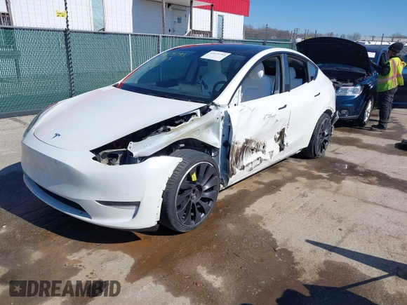 2021 Tesla Model Y Performance with VIN 5YJYGDEF8MF246658, listed as a IAAI auction lot 41679793 with 28,015 mi miles and . Bid and sale history available at DreamBid. Image 21.