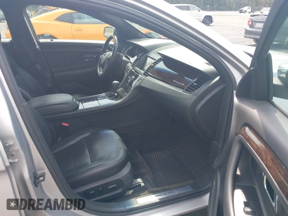 2013 Ford Taurus Limited with VIN 1FAHP2F87DG235392, listed as a IAAI auction lot 42700160 with 123,904 mi miles and . Bid and sale history available at DreamBid. Image 5.