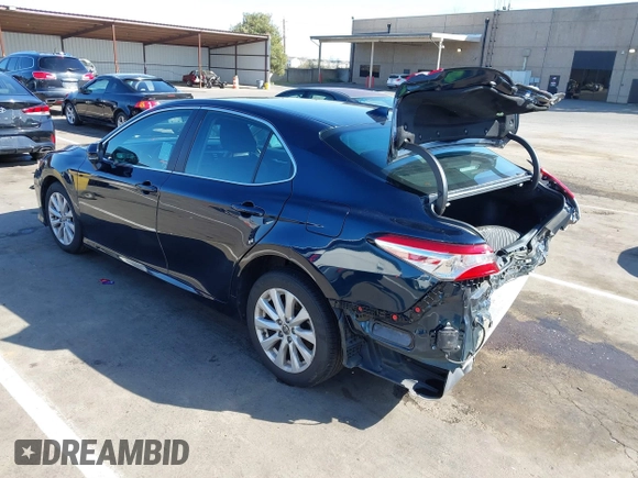 2020 Toyota Camry LE with VIN 4T1L11AKXLU999381, listed as a IAAI auction lot 41782771 with 58,526 mi miles. Bid and sale history available at carsss.com. Image 3.