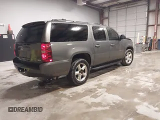 2011 Chevrolet Suburban LT with VIN 1GNSCJE0XBR180270, listed as a IAAI auction lot 41531193 with 202,493 mi miles. Bid and sale history available at carsss.com. Image 4.