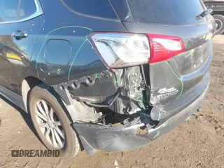 2018 Chevrolet Equinox LT z VIN 2GNAXSEV2J6122861, wystawiony jako IAAI lot #41741471 z przebiegiem 121 123 mil mil oraz . Historia ofert i sprzedaży dostępna na DreamBid. Obrazek 6.