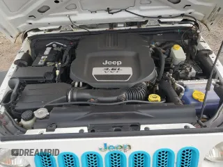 2012 Jeep Wrangler Unlimited Sport z VIN 1C4BJWDG9CL169159, wystawiony jako Copart lot #83647894 z przebiegiem 120 684 mil mil oraz Szkoda całkowita • Salvage title. Historia ofert i sprzedaży dostępna na DreamBid. Obrazek 12.