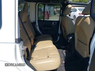 2019 Jeep Wrangler Unlimited Sahara with VIN 1C4HJXEN5KW509806, listed as a IAAI auction lot 42071325 with 95,549 mi miles and . Bid and sale history available at DreamBid. Image 8.