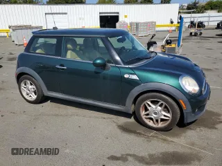 2009 MINI Hardtop S with VIN WMWMF73539TW85698, listed as a Copart auction lot 54957685 with 98,429 mi miles and Clean Title. Bid and sale history available at DreamBid. Image 4.