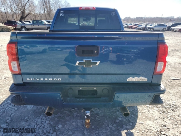 2017 Chevrolet Silverado 1500 High Country with VIN 3GCUKTEC4HG130595, listed as a Copart auction lot 46043255 with 105,670 mi miles and Salvage Title. Bid and sale history available at carsss.com. Image 6.
