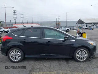 2017 Ford Focus Titanium with VIN 1FADP3N2XHL230766, listed as a IAAI auction lot 42386275 with 64,138 mi miles and . Bid and sale history available at DreamBid. Image 13.