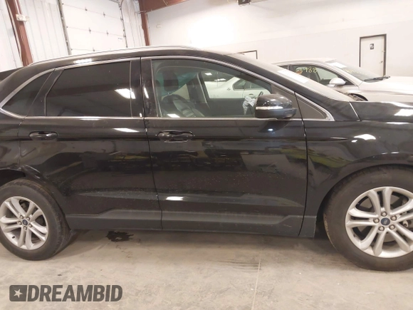2020 Ford Edge SEL z VIN 2FMPK4J95LBA90533, wystawiony jako IAAI lot #42151916 z przebiegiem 57 197 mil mil oraz . Historia ofert i sprzedaży dostępna na DreamBid. Obrazek 13.