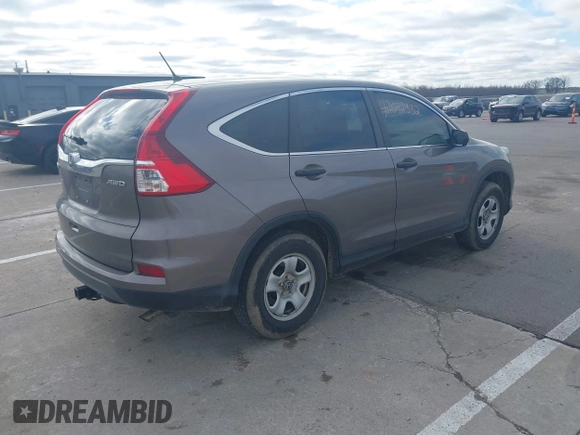 2015 Honda CR-V LX with VIN 5J6RM4H35FL127992, listed as a IAAI auction lot 42042332 with 141,642 mi miles and . Bid and sale history available at DreamBid. Image 4.