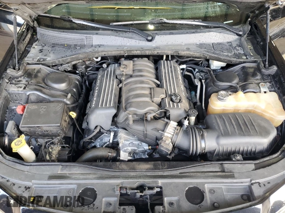 2013 Chrysler 300 SRT-8 z VIN 2C3CCAFJ5DH652791, wystawiony jako Copart lot #55895915 z przebiegiem 146 485 mil mil oraz Szkoda całkowita • Salvage title. Historia ofert i sprzedaży dostępna na DreamBid. Obrazek 11.