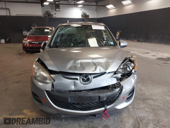 2012 Mazda 2 Sport with VIN JM1DE1KY7C0150803, listed as a IAAI auction lot 41932409 with 89,474 mi miles. Bid and sale history available at carsss.com. Image 12.