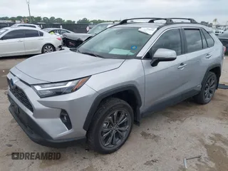 2023 Toyota RAV4 Hybrid XLE Premium z VIN 4T3B6RFV2PU138031, wystawiony jako IAAI lot #42127990 z przebiegiem 14 191 mil mil oraz . Historia ofert i sprzedaży dostępna na DreamBid. Obrazek 2.