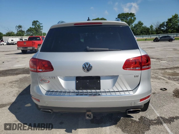 2014 Volkswagen Touareg Lux with VIN WVGEF9BP1ED012267, listed as a Copart auction lot 58924055 with 81,009 mi miles and Salvage title. Bid and sale history available at DreamBid. Image 6.