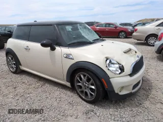 2009 MINI Hardtop S with VIN WMWMF73569TW87347, listed as a Copart auction lot 59445035 with Not provided miles and Salvage title. Bid and sale history available at DreamBid. Image 4.