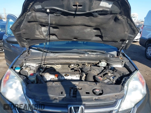 2010 Honda CR-V EX with VIN 5J6RE4H52AL039991, listed as a IAAI auction lot 41828104 with 131,013 mi miles. Bid and sale history available at carsss.com. Image 10.