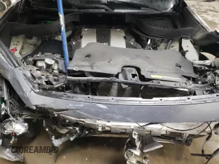 2014 Infiniti QX70 z VIN JN8CS1MW5EM412429, wystawiony jako Copart lot #82933934 z przebiegiem Nie podano mil oraz Szkoda całkowita • Salvage title. Historia ofert i sprzedaży dostępna na DreamBid. Obrazek 11.