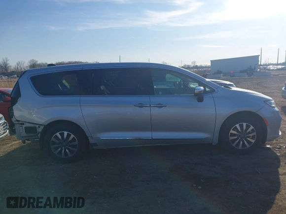 2023 Chrysler Pacifica Hybrid Limited with VIN 2C4RC1S72PR588627, listed as a IAAI auction lot 42063631 with 52,799 mi miles and . Bid and sale history available at DreamBid. Image 14.