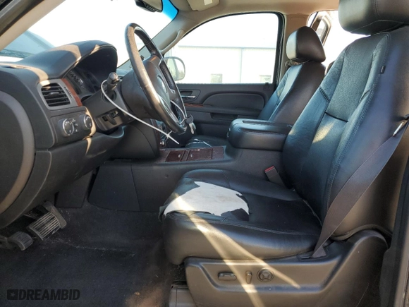 2012 Chevrolet Suburban LTZ with VIN 1GNSKKE71CR310010, listed as a Copart auction lot 48943445 with 311,512 mi miles and Clean Title. Bid and sale history available at carsss.com. Image 7.