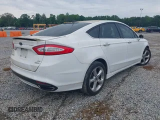 2015 Ford Fusion SE z VIN 3FA6P0H98FR239349, wystawiony jako IAAI lot #42224096 z przebiegiem 244 653 mil mil oraz . Historia ofert i sprzedaży dostępna na DreamBid. Obrazek 4.