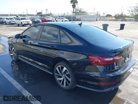 2021 Volkswagen Jetta GLI S with VIN 3VW6T7BU7MM002015, listed as a IAAI auction lot 41349898 with 44,416 mi miles and . Bid and sale history available at DreamBid. Image 3.
