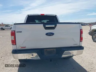 2019 Ford F-150 XL with VIN 1FTEW1E42KKE77610, listed as a IAAI auction lot 41765076 with 155,437 mi miles and . Bid and sale history available at DreamBid. Image 16.