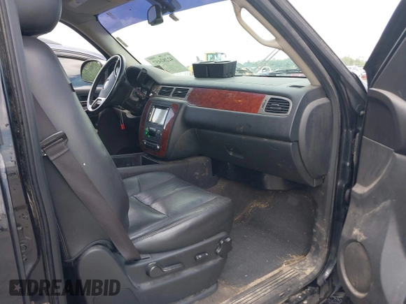 2013 Chevrolet Tahoe LT with VIN 1GNSCBE00DR337071, listed as a IAAI auction lot 42282457 with 151,460 mi miles and . Bid and sale history available at DreamBid. Image 5.