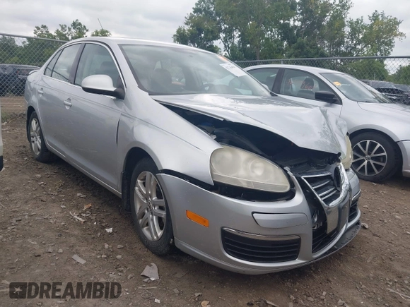 2007 Volkswagen Jetta Wolfsburg Edition z VIN 3VWEF71K77M166713, wystawiony jako IAAI lot #42746458 z przebiegiem 214 241 mil mil oraz . Historia ofert i sprzedaży dostępna na DreamBid. Obrazek 1.