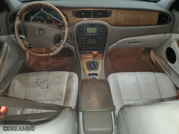 2004 Jaguar S-Type with VIN SAJEA01T74FN12824, listed as a Copart auction lot 82106064 with 0 mi miles and Salvage Title. Bid and sale history available at carsss.com. Image 8.