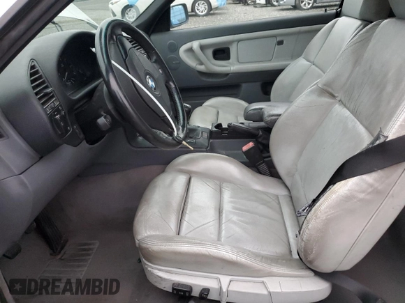 1999 BMW 3 Series 328ic with VIN WBABK7331XET68084, listed as a Copart auction lot 86205884 with 0 mi miles and Salvage Title. Bid and sale history available at carsss.com. Image 7.