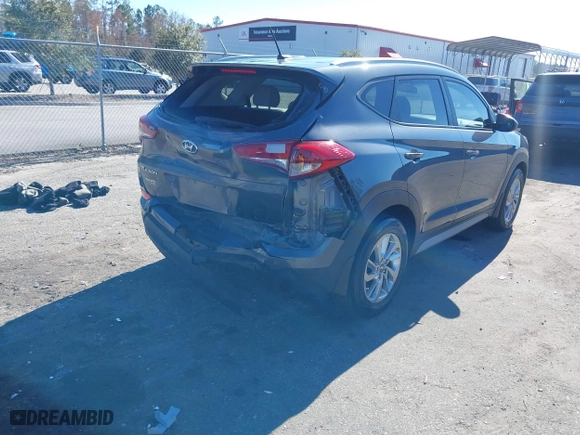 2017 Hyundai Tucson SE Plus with VIN KM8J33A45HU420349, listed as a IAAI auction lot 41296190 with 77,910 mi miles. Bid and sale history available at carsss.com. Image 4.
