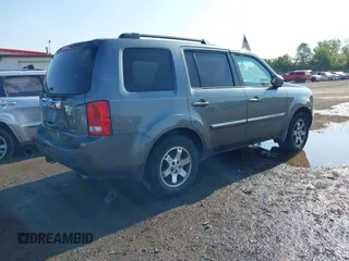 2010 Honda Pilot Touring with VIN 5FNYF3H87AB006023, listed as a IAAI auction lot 40310546 with 135,482 mi miles and . Bid and sale history available at carsss.com. Image 4.