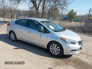2016 Kia Forte LX z VIN KNAFX4A65G5558193, wystawiony jako IAAI lot #41810559 z przebiegiem 87 517 mil mil oraz . Historia ofert i sprzedaży dostępna na DreamBid. Obrazek 1.