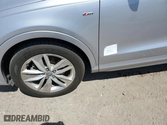 2018 Audi Q3 Premium z VIN WA1BCCFS3JR016890, wystawiony jako Copart lot #52594015 z przebiegiem 63 871 mil mil oraz Szkoda całkowita • Salvage title. Historia ofert i sprzedaży dostępna na DreamBid. Obrazek 13.