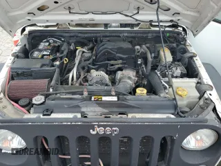 2015 Jeep Wrangler Unlimited Sport с VIN 1C4BJWDG3FL570131, выставлен на аукционе Copart как лот 64418415 с пробегом 112 362 миль миль и Списание • Salvage title. История ставок и продаж доступна на DreamBid. Изображение 12.
