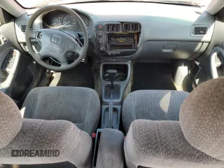 1999 Honda Civic LX with VIN 1HGEJ6670XL002593, listed as a Copart auction lot 68564474 with 255,621 mi miles and Salvage Title. Bid and sale history available at carsss.com. Image 8.