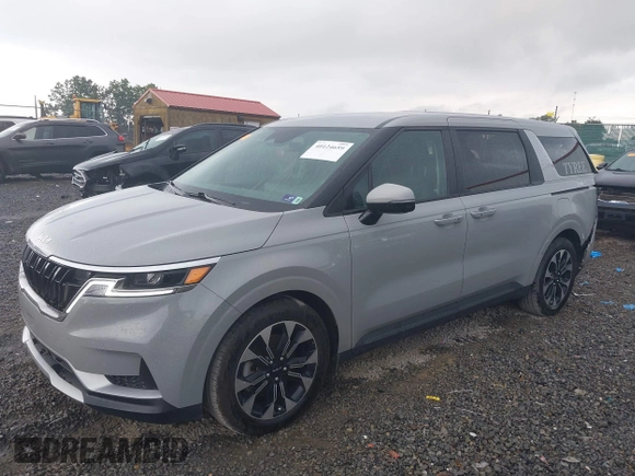 2024 Kia Carnival EX with VIN KNDNC5H31R6377648, listed as a IAAI auction lot 40124659 with 14,386 mi miles and . Bid and sale history available at DreamBid. Image 2.