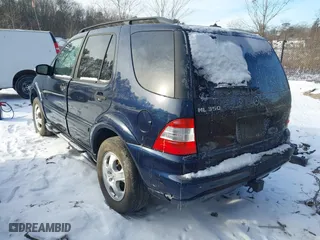 2003 Mercedes-Benz M-Class 3.7L with VIN 4JGAB57E33A421704, listed as a IAAI auction lot 41404597 with 192,078 mi miles. Bid and sale history available at carsss.com. Image 3.