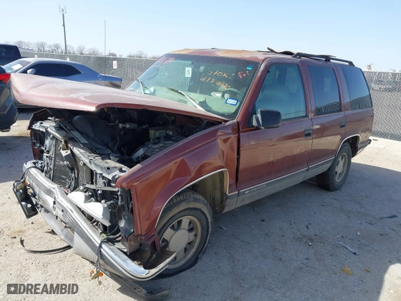 1999 Chevrolet Tahoe with VIN 1GNEC13R9XJ341261, listed as a IAAI auction lot 41741710 with 234,676 mi miles. Bid and sale history available at carsss.com. Image 2.