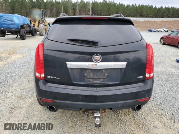 2014 Cadillac SRX Premium Collection z VIN 3GYFNGE3XES577569, wystawiony jako Copart lot #48399735 z przebiegiem Nie podano mil oraz Szkoda całkowita • Salvage title. Historia ofert i sprzedaży dostępna na DreamBid. Obrazek 6.