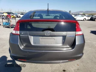 2010 Honda Insight EX with VIN JHMZE2H73AS039935, listed as a Copart auction lot 46192575 with 127,329 mi miles and Salvage Title. Bid and sale history available at DreamBid. Image 6.